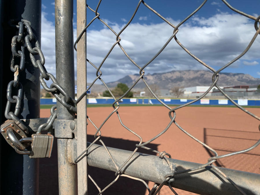 Cover art A baseball dimond behind a locked gate. Photo Robert Rosales
